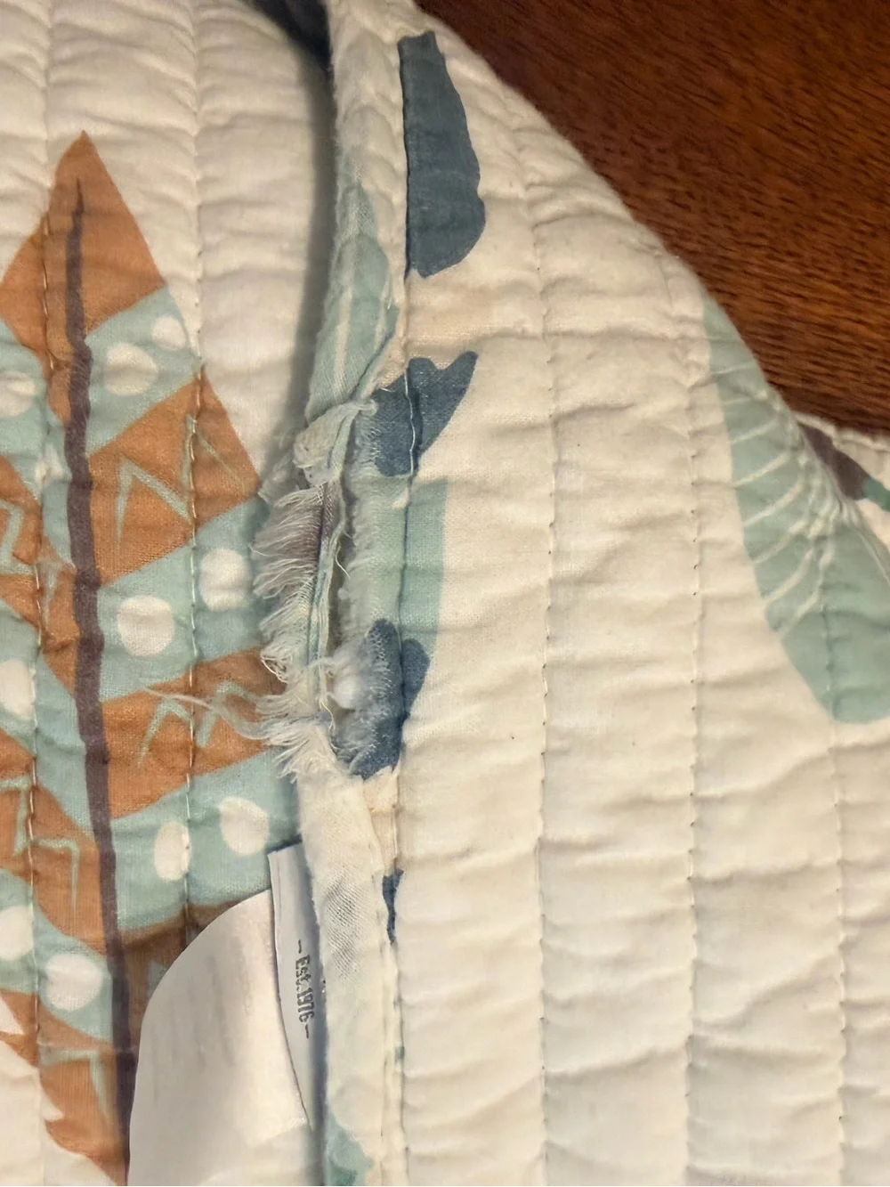 Rod’s True Western Feather and Arrow print quilt in Cream, Teal & Mustard.